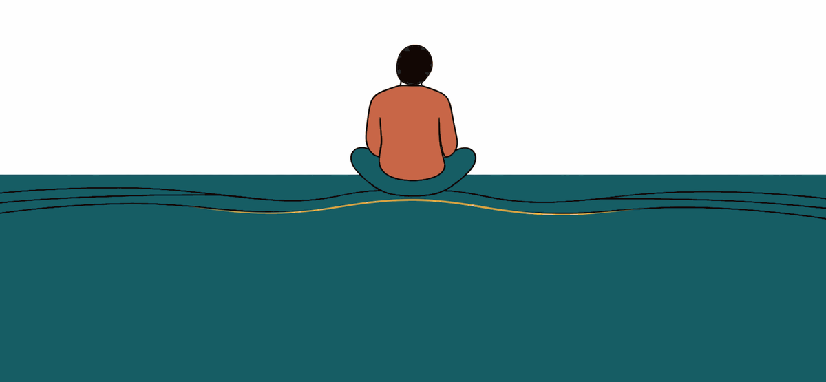 A small figure sitting cross-legged on calm teal water.