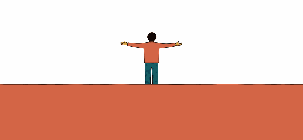 A figure seen from behind with arms open wide, standing on warm terracotta ground.